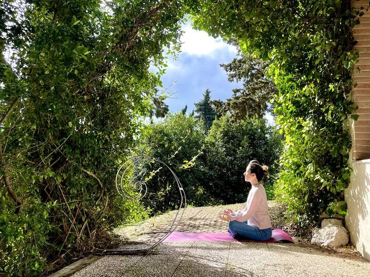 Yoga in the garden archway