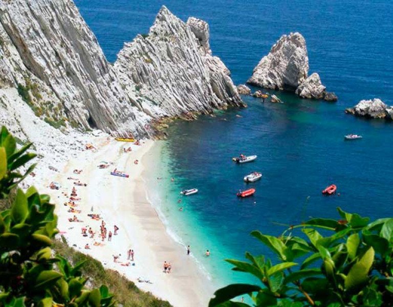 Wild beach beneath the cliffs